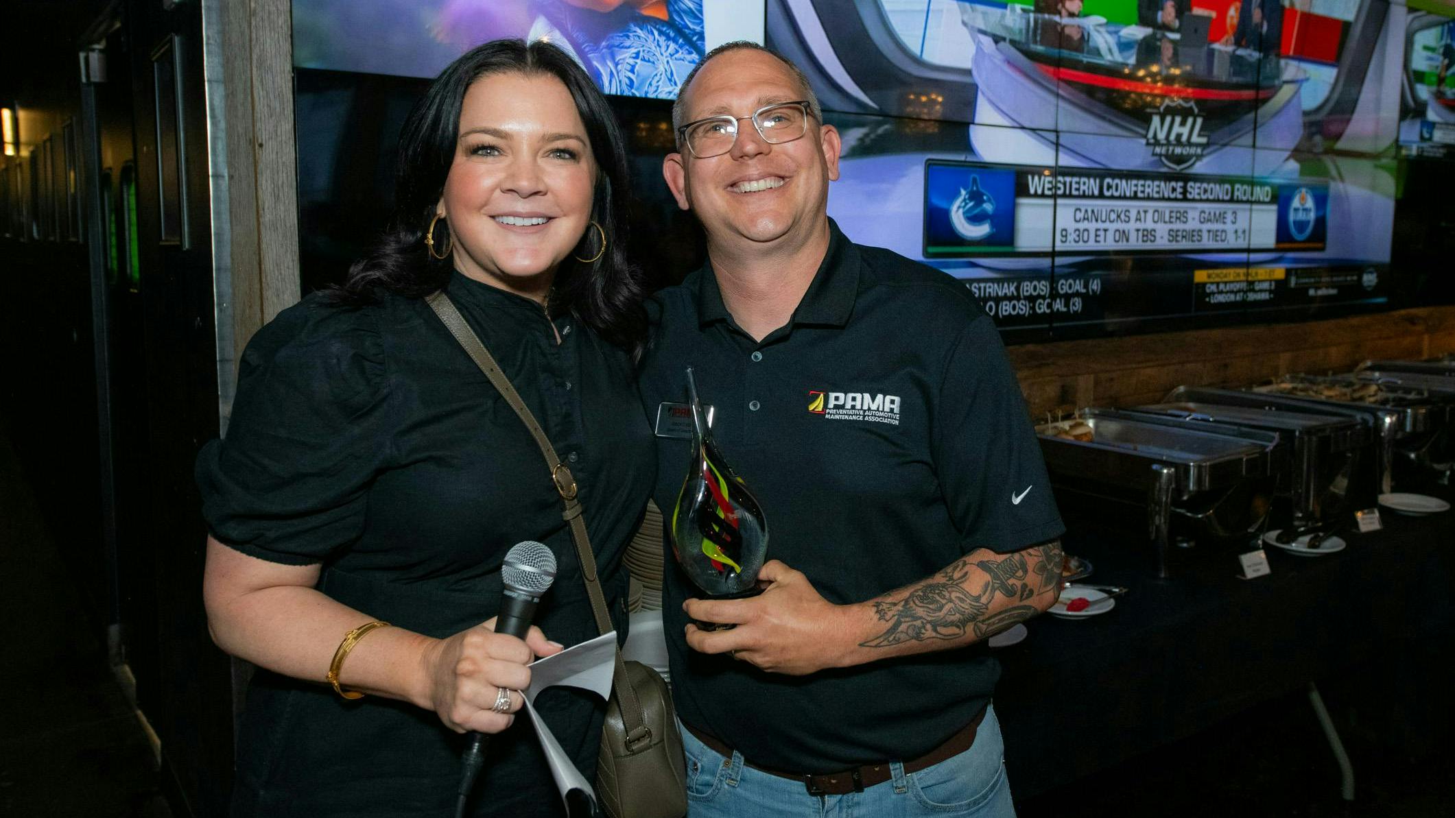 PAMA Operator of the Year, Jason Lyon of AutoLube Express (right).