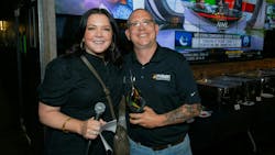 PAMA Operator of the Year, Jason Lyon of AutoLube Express (right). PAMA Operator of the Year, Jason Lyon of AutoLube Express (right).