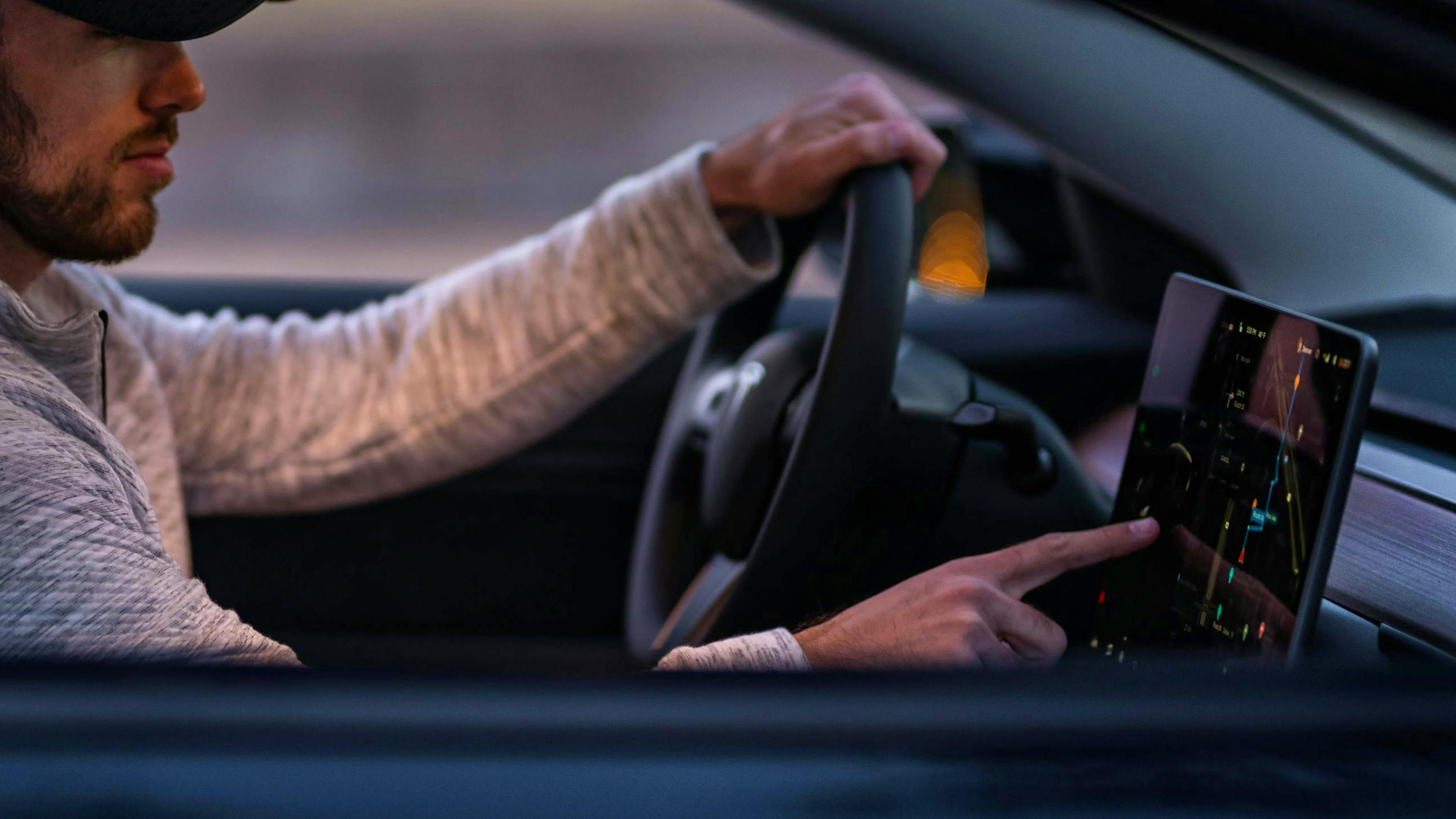 66674681b9a378800600ef61 Man In Tesla W Screen