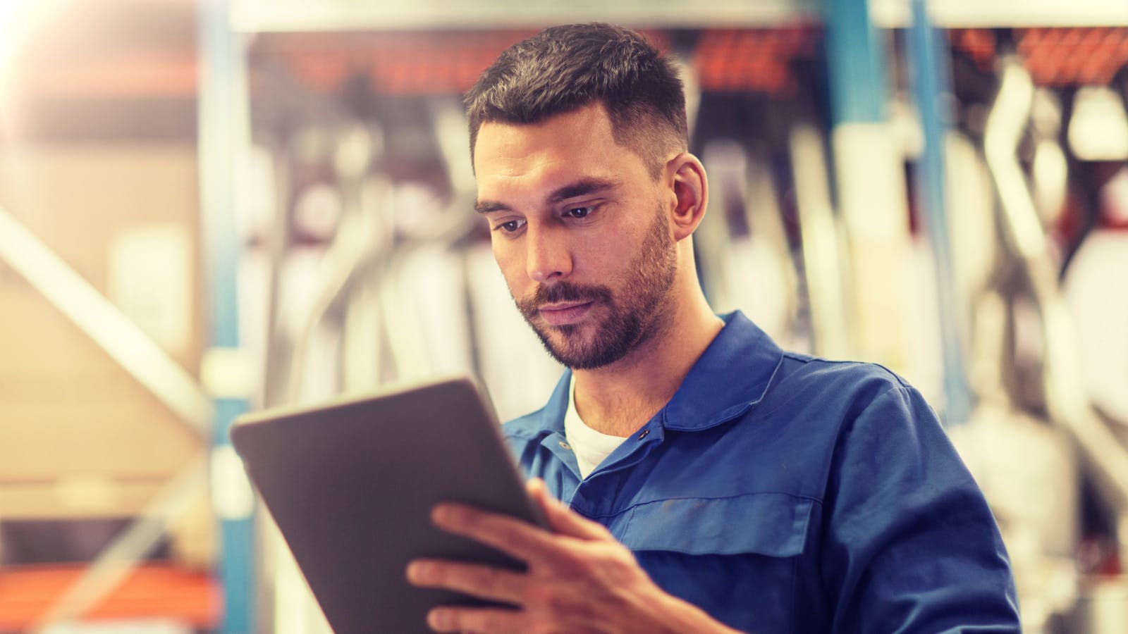 67f3d1c4cc2888709dcaf166 Mechanic With Tablet