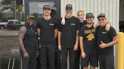 Employees at Costa Oil in Holland, Michigan